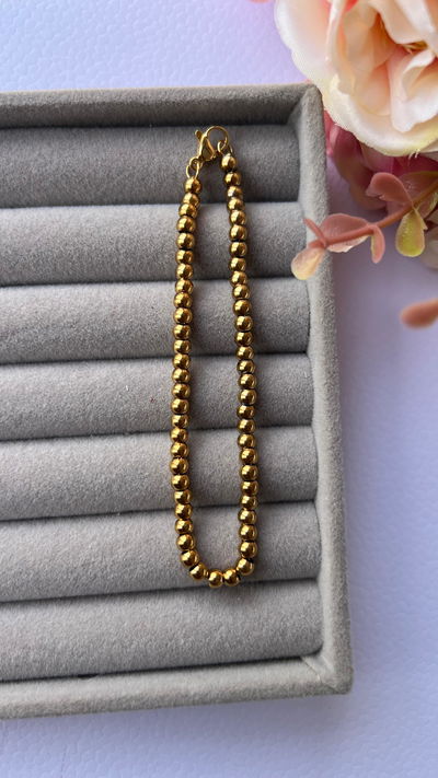 Pulseras con pelotitas