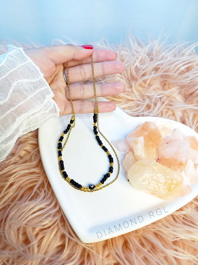 Gargantilla doble negra.