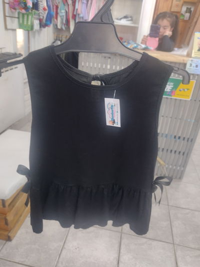 Musculosa lino con moño