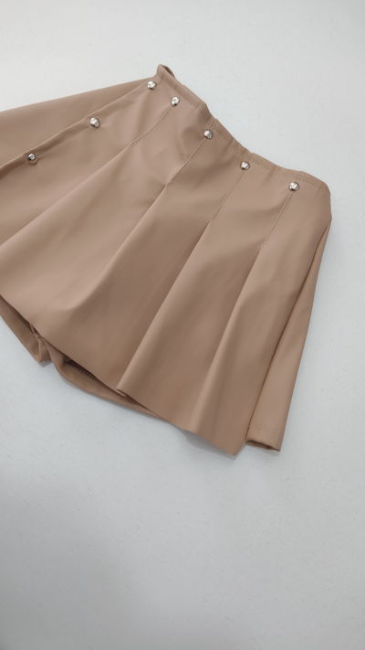 Shorts pollera engomado