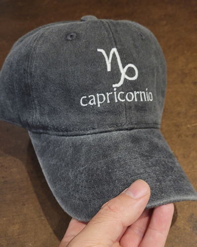 Gorra gabardina negro gastado Capricornio