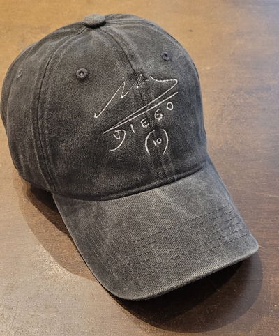 Gorra gabardina negro gastado Firma del mas grande