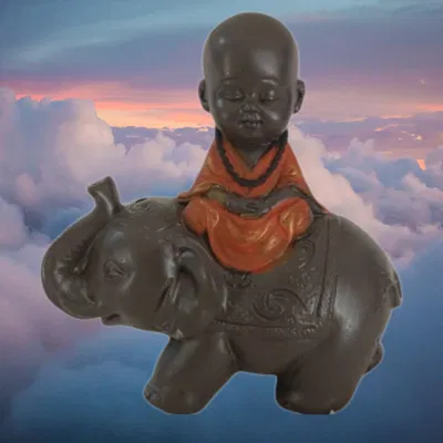 ELEFANTE CON MONJE 12 CM