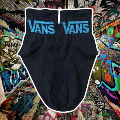 Vans negra con turqueza