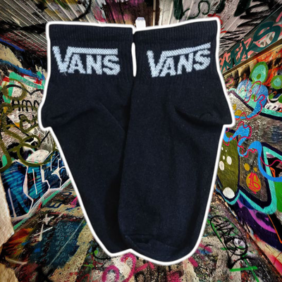 Vans negra con blanco
