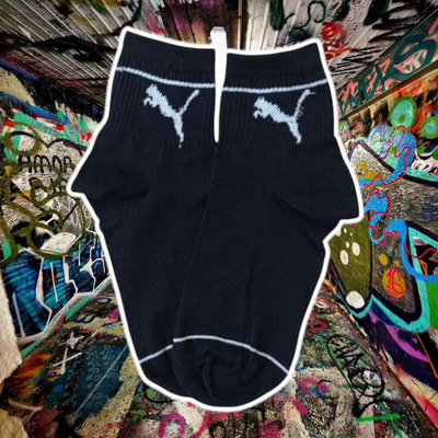 Puma negro con blanco