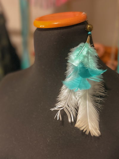 Aros plumas solitaria turquesa