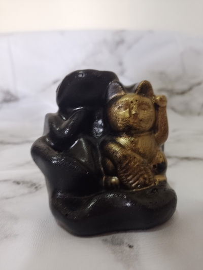 Cascada de humo gato de la suerte 