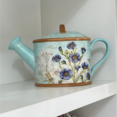 Tetera vintage Susan Winget con forma de regadera 