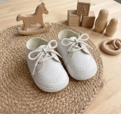 Zapatito blanco no caminante