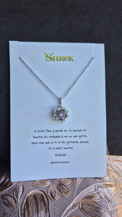 Collar flor giratoria. Dorado y plateado 