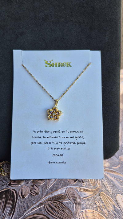 Collar flor giratoria. Dorado y plateado 