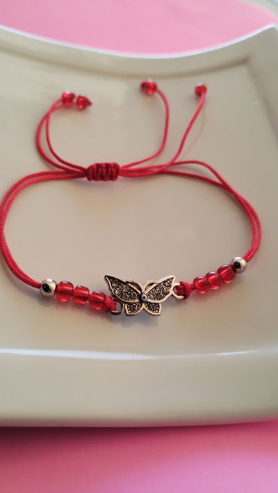 Pulsera mariposa con strass y ojo turco 