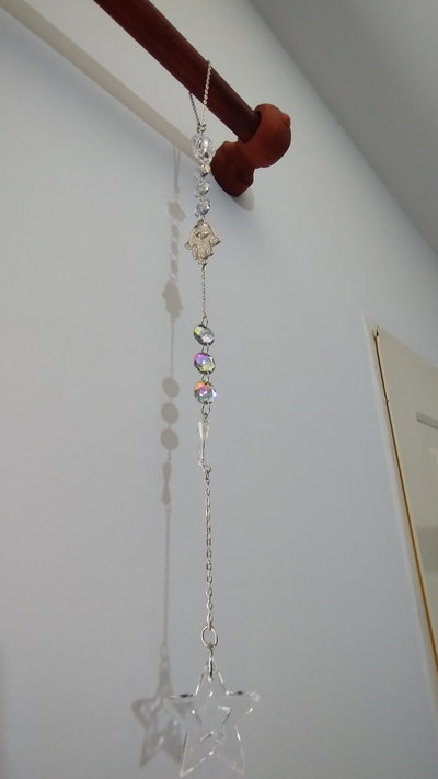 Atrapa sol mano de Fátima y estrella ⭐