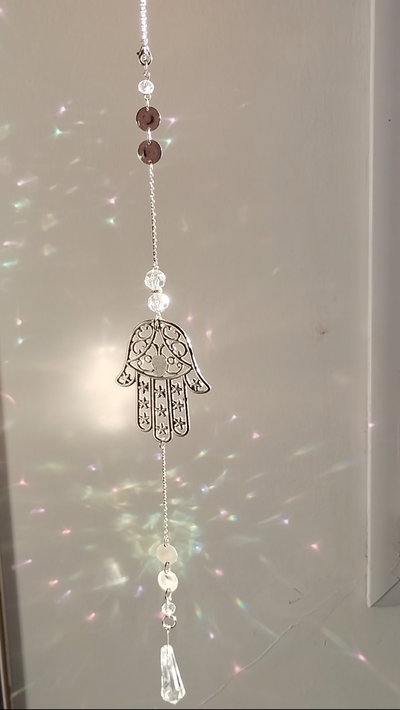 Atrapa sol mano Fátima 🪬✨