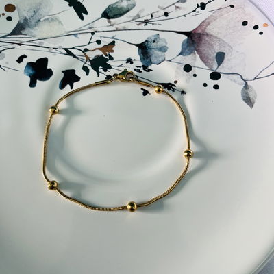 Pulsera pelotitas 