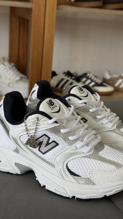 Zapatillas NB 530 blanco azul (importadas)
