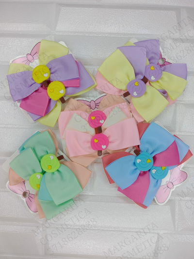 Hebillas moño con aplique de paleta x par