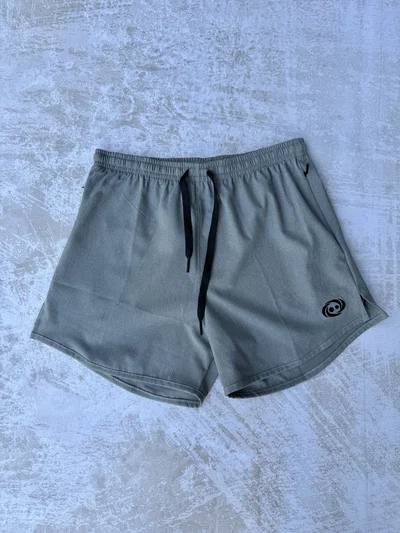 Short Tela Plana Laser Con Bolsillo 