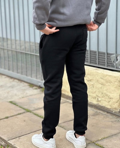 PANTALÓN JOGGING CON PUÑO FRIZADO ADULTO 