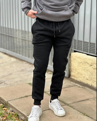 PANTALÓN JOGGING CON PUÑO FRIZADO ADULTO 