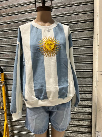 BUZO ARG FRIZADO CELESTE - RAYAS VERTICAL - 