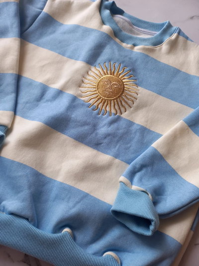 BUZO FRIZADO ARG KIDS - CELESTE -