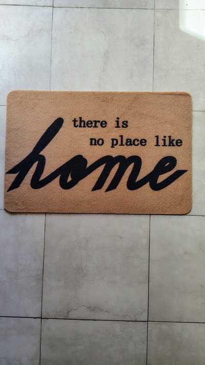 Alfombra de entrada marrón
