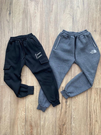 Pantalones nike y north face niños