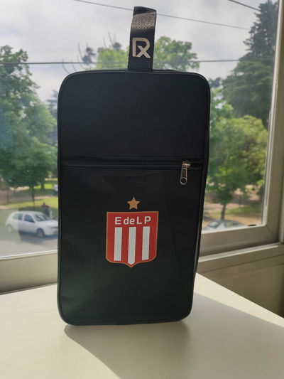 Botinero - Estudiantes