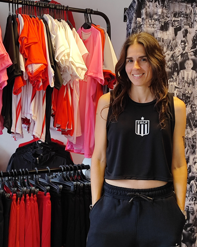 Musculosa crop deportiva negra - Estudiantes 