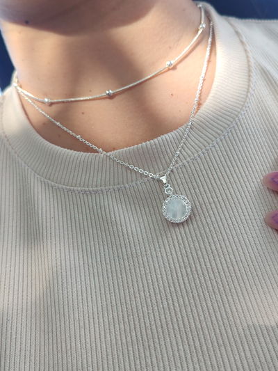 Collar dije giratorio nacar (solo el collar de abajo)