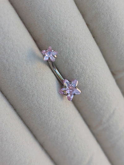 Piercing ombligo doble estrella rosa 