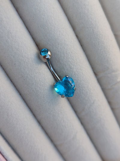 Piercing ombligo corazón turquesa 