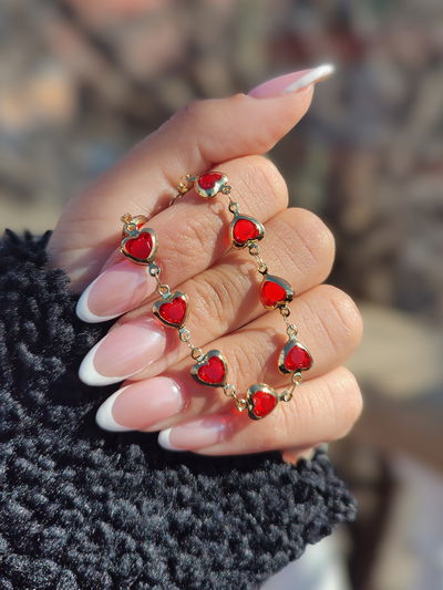 Pulsera corazones rojos