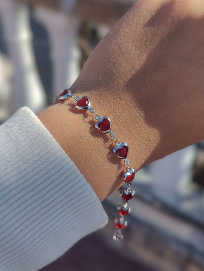 Pulsera corazones rojos aq