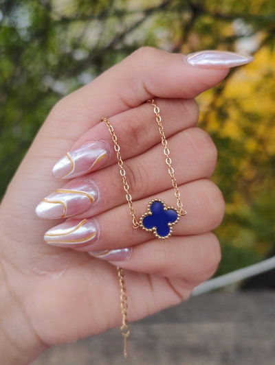 Pulsera Vancleff gold un solo trébol azul