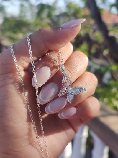 Collar mariposita combinada