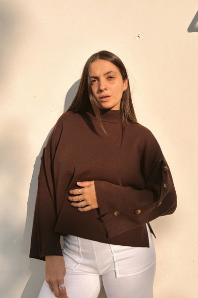 Sweater de mangas anchas con botones
