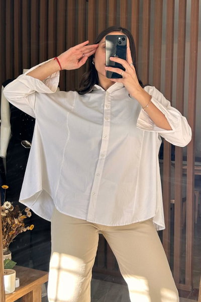 Camisa oversize con recortes decorativos