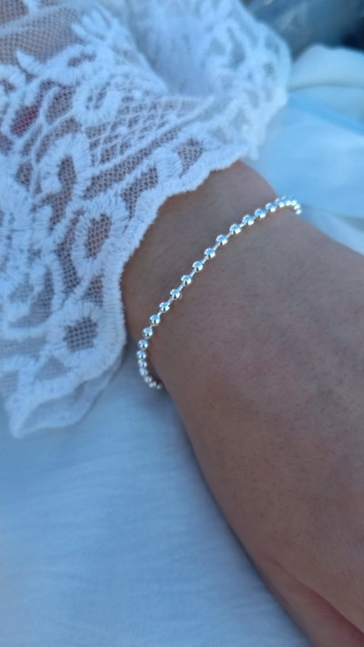 PULSERA DE ACERO BLANCO BOLITAS