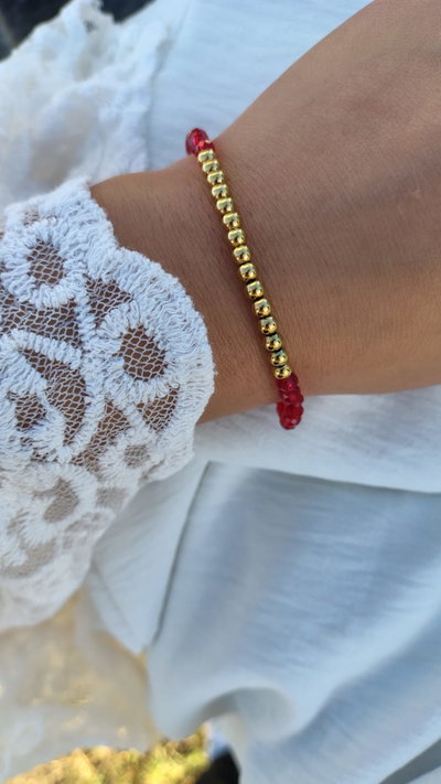 PULSERA CRISTAL ROJO Y DORADO