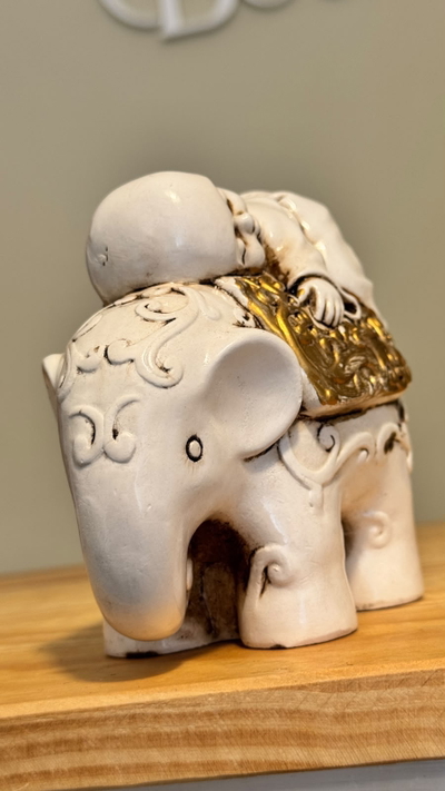 BUDA EN ELEFANTE PATINADO 11CM 