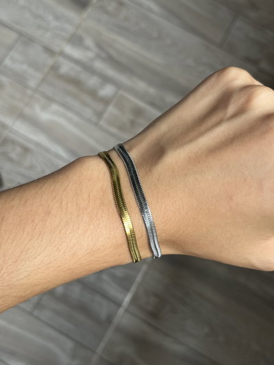 Pulseras planas en acero 