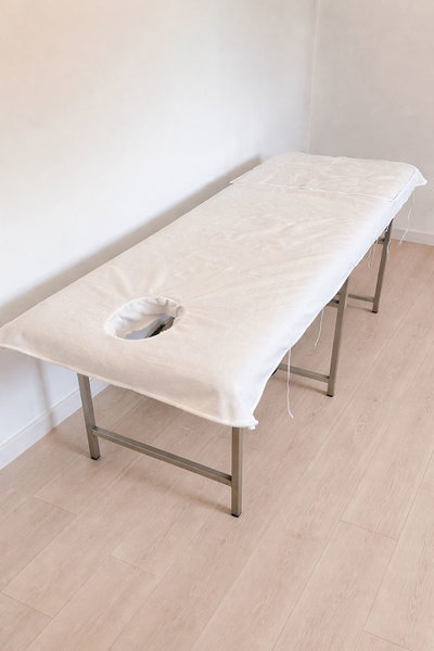 Cubrecamillas con orificio facial 