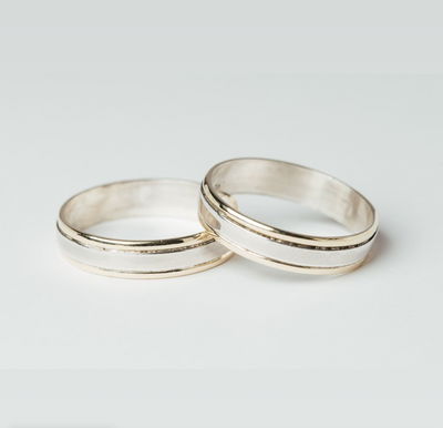 PAR DE ALIANZAS PLATA 925 Y ORO