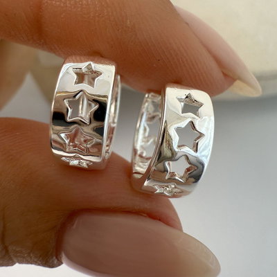 ARGOLLAS ESTRELLITAS CALADAS ACERO BLANCO