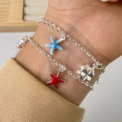 PULSERA ESTRELLA DE MAR COLORIDA + TREBOL