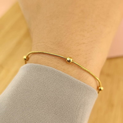 PULSERA ACERO DORADO