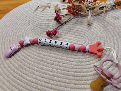 Portachupete broche plastico